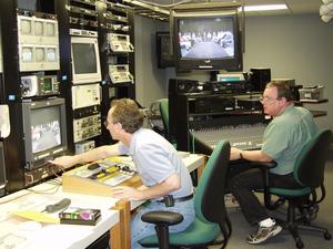 [CMP staff in production control room, view from left, 2]