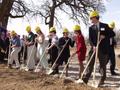 Primary view of [Individuals turn dirt at SRC groundbreaking, 1]