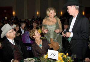 [Gretchen Bataille with guests at table 19, 2008 Emerald Ball, 2]