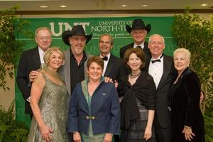 [Group photograph with Ray Benson at 2008 Emerald Ball]