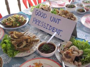 ["Good UNT Pressident" sign at Thailand restaurant]