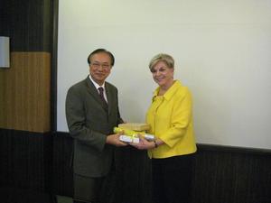 [Gretchen Bataille receives gifts at NIDA delegation meeting]
