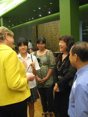 [Gretchen Bataille converses at UNT alumni party in Bangkok]