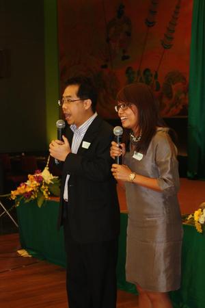 Primary view of object titled '[Smarom and Kallaya speak at UNT alumni party in Bangkok, closeup]'.
