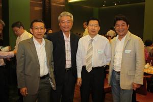 [Four men at UNT alumni party in Bangkok]
