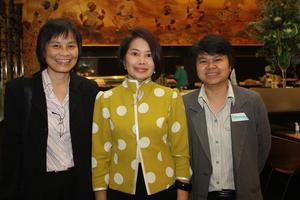 [Patamaporn Sukplang and Acharawan Thongmee with woman at UNT alumni party in Bangkok]