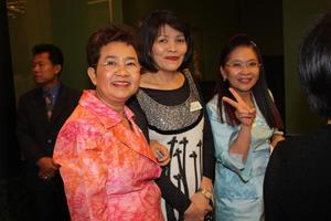 [Three women at UNT alumni party in Bangkok]