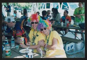 Primary view of object titled '[Smiling "twins" in rainbow afro wigs: Lone Star Ride 2002 event photo]'.