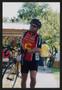 Primary view of [Leonard Fiorenza carrying his bike: Lone Star Ride 2002 event photo]