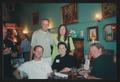Photograph: [5 people gathered around a small bar table: Lone Star Ride 2003 even…