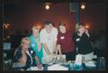 Photograph: [Four people standing around a restaurant table: Lone Star Ride 2003 …