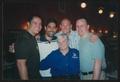 Photograph: [Janie Bush posing with four men: Lone Star Ride 2003 event photo]