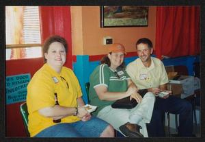 [Tim and Tam and other all seated on folding chairs: Lone Star Ride 2003 event photo]