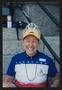 Photograph: [Cyclist smiling wearing a tiara: Lone Star Ride 2003 event photo]