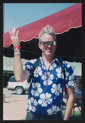 [Cyclist in a blue hibiscus print jersey: Lone Star Ride 2003 event photo]