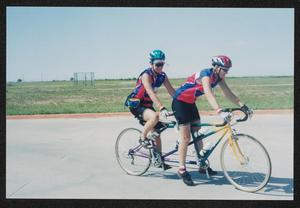 Primary view of object titled '[Riders on a tandem bike: Lone Star Ride 2003 event photo]'.