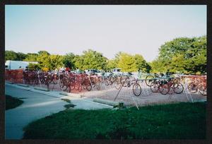 [Bikes lined up behind orange netting: Lone Star Ride 2003 event photo]