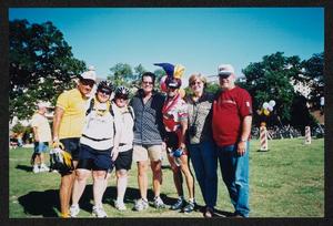 [Group of 7 embracing shoulder to shoulder: Lone Star Ride 2003 event photo]