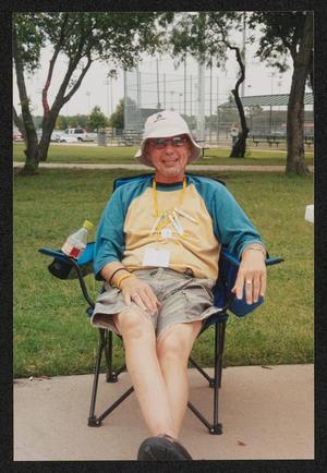 [Man smiling in a lawn chair: Lone Star Ride 2004 event photo]