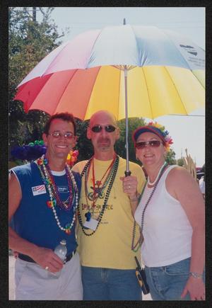 [Rainbow umbrella volunteers: Lone Star Ride 2004 event photo]
