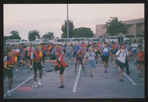 [Morning group leg stretches: Lone Star Ride 2004 event photo]