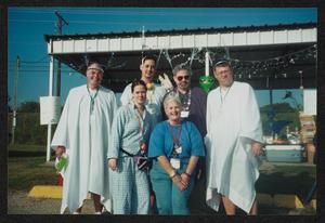 [Volunteers dressed in sheets: Lone Star Ride 2004 event photo]