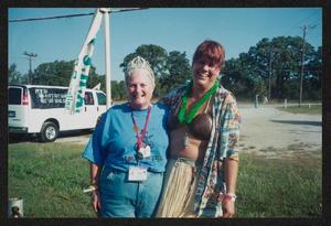 [Smiling volunteer duo: Lone Star Ride 2004 event photo]