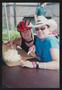 Photograph: [Two individuals eating a meringue pie: Lone Star Ride 2004 event pho…