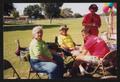 Thumbnail image of item number 1 in: '[Four seated crew members: Lone Star Ride 2001 event photo]'.