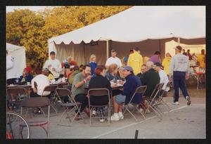 [Banquet tables set up outside a large white pavilion tent: Lone Star Ride 2001 event photo]