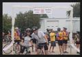 Thumbnail image of item number 1 in: '[Cyclists #312 and #316 under a constructed archway: Lone Star Ride 2010 event photo]'.