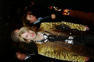 [Individual in a tiger print jacket, 2005 Black Tie Dinner, closeup]