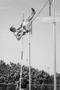 Photograph: [Josh Papagno competes in pole vault event, 1]