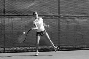 [Lynley Wasson hits forehand during Stephen F. Austin match, 9]