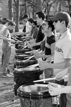 [Percussion Ensemble students practice outside of Clark Hall, 1]