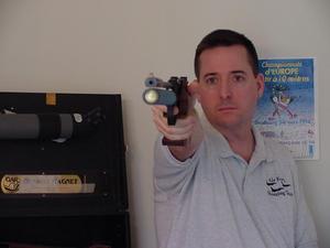 [Steve Swartz poses with air pistol, 5]