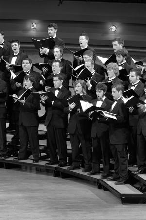 [Men perform with UNT choir]