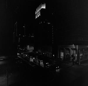 [Dark photo of downtown Fort Worth]