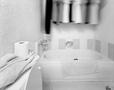 Photograph: [Photograph of a bathtub in a bathroom]