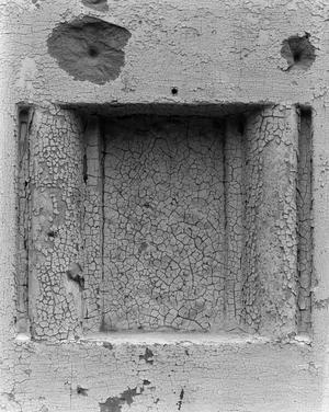 [Photograph of an old exterior wall]