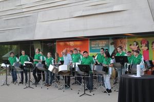 [Percussionists playing in the museum's courtyard, College of Music at the Perot Museum, 8]