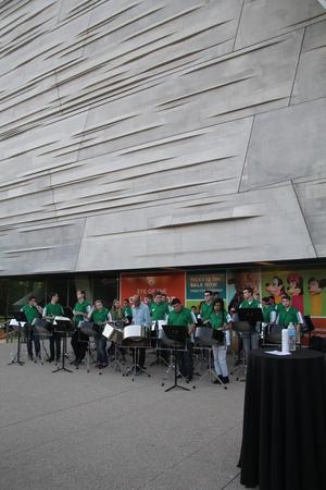 [Percussionists playing in the museum's courtyard, College of Music at the Perot Museum, 10]