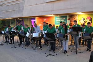 [Percussionists playing in the museum's courtyard, College of Music at the Perot Museum, 14]