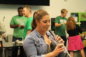 [Person playing the clarinet, College of Music at the Perot Museum]