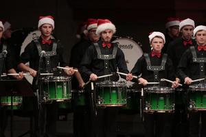 [Drummers with green drums performing at the Percussion Holiday Performance]
