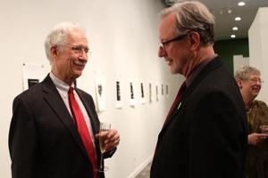 [James Scott conversing with person at the Jake Heggie post-concert reception]