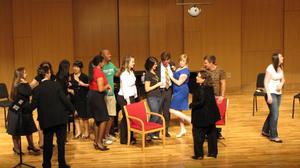 [Students taking photos with Heggie at the Student recital during Jake Heggie's residency, 1]