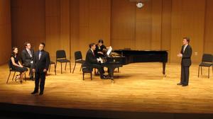 [Two singers performing with Heggie at the Student recital during Jake Heggie's residency, 1]