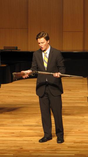 [Close-up of singer wearing a yellow tie at the Student recital during Jake Heggie's residency, 12]