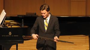 [Close-up of singer wearing a yellow tie at the Student recital during Jake Heggie's residency, 16]
